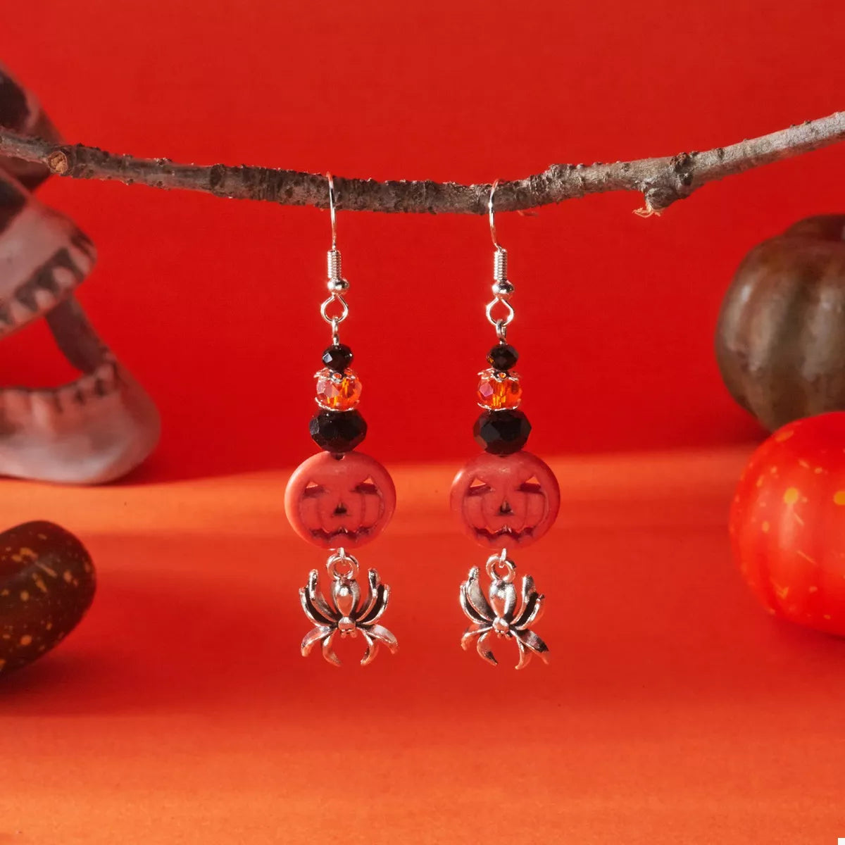 Halloween spider pumpkin drop earrings featuring orange pumpkin and black spider charms, trendy jewelry by Trendsi