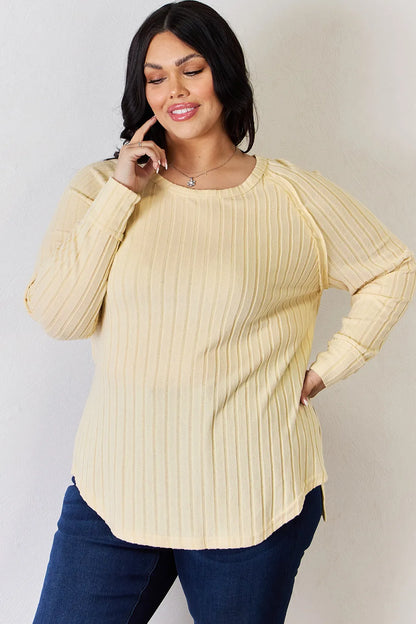 Trendsi Basic Bae full-size ribbed round neck slit T-shirt, soft fabric, ribbed texture, and flattering fit shown in the image.