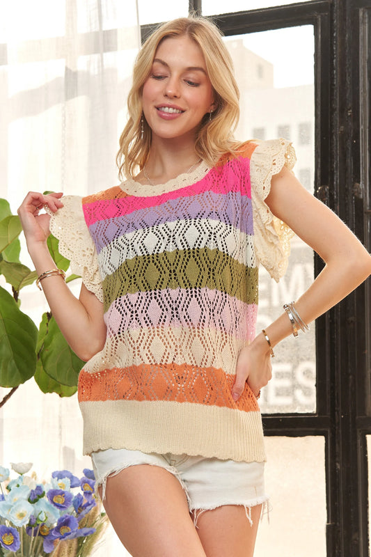Multi-color crochet top with eyelet sleeves by Trendsi, featuring vibrant patterns and lightweight design for a stylish look.