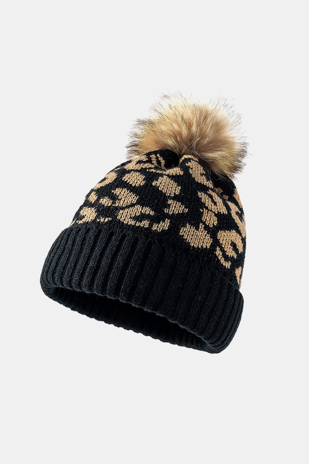Leopard print pom-pom cuffed beanie by Trendsi, featuring a cozy knit design with playful pom-pom detail.