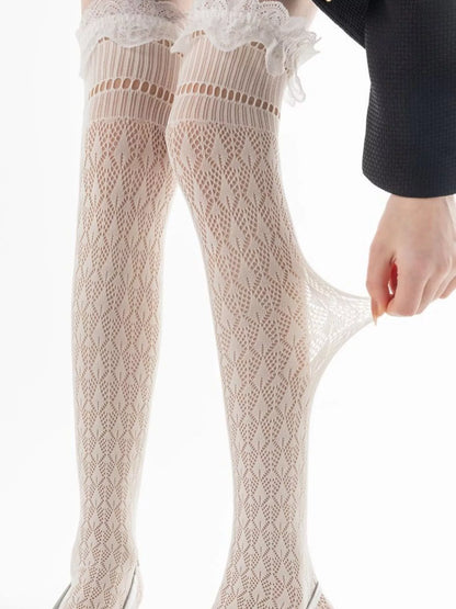 Lace over-the-knee hollow-out stockings by Trendsi, featuring intricate lace design and sheer fabric for stylish legwear.