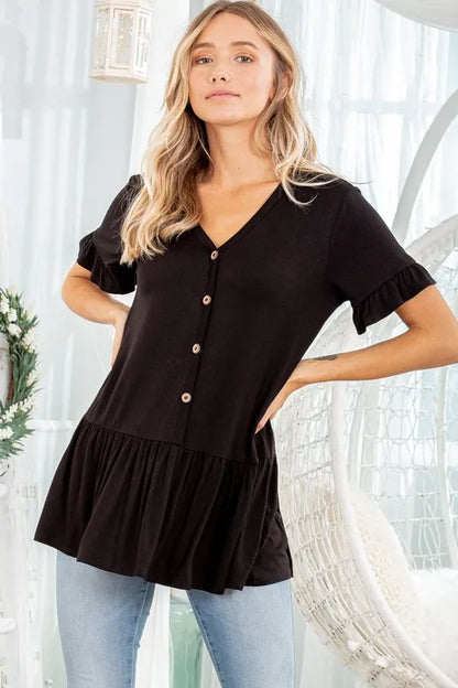 Heimish plus size ruffled v-neck short sleeve blouse with a relaxed fit, featuring a stylish ruffle detail and soft fabric.