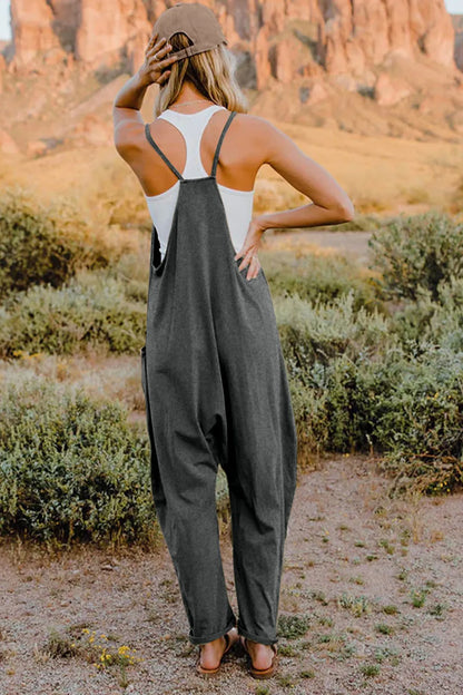 Full-length image of Trendsi Double Take sleeveless jumpsuit with v-neck and pockets, showcasing a stylish, casual women's jumpsuit.