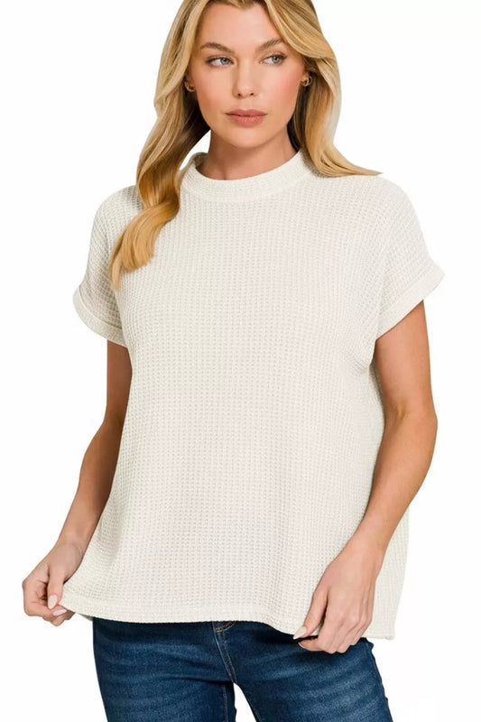 Soft pink Zenana chenille waffle cap sleeve sweater with a cozy, textured knit fabric and a relaxed fit.