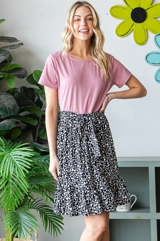 Heimish plus size mini dress featuring short sleeves with solid and animal print patterns, stylish and comfortable for warm weather.