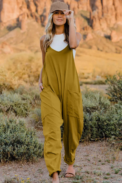 Trendsi Double Take full-size sleeveless V-neck jumpsuit with pockets, showing the front view on a model.