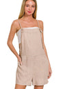 Zenana washed linen knot strap romper, lightweight and stylish, featuring a relaxed fit and tie straps, perfect for casual summer wear.