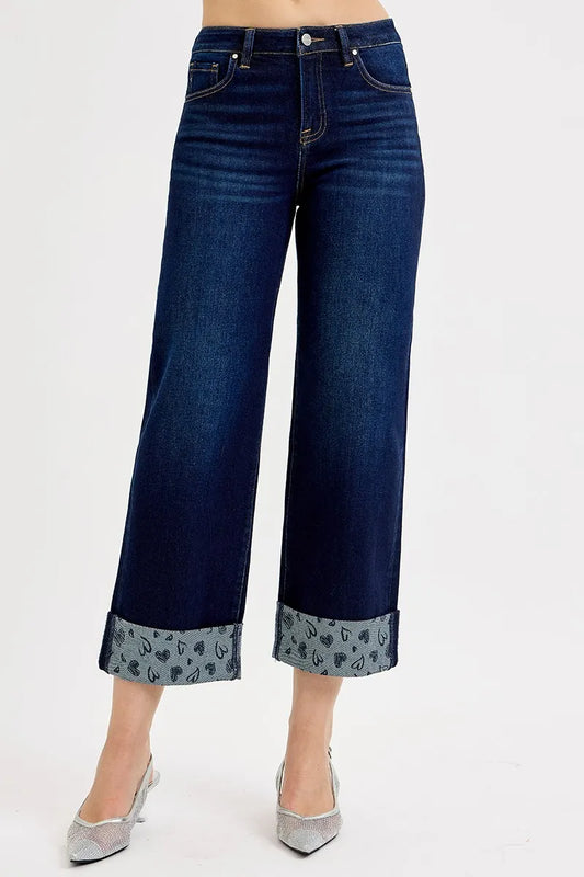 Plus size RISEN mid-rise crop wide jeans with printed cuff detailing, showcasing trendy denim style and comfortable fit.