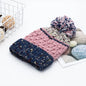 Contrast thermal hat with pompom by Trendsi, featuring a cozy knit design and playful pompom detail on top.