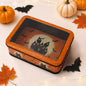 Halloween decorative metal storage box with window display, featuring spooky design and vintage style for festive storage.