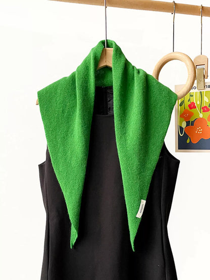 Solid color knit scarf from Trendsi featuring soft, cozy fabric in a simple, versatile design perfect for cold weather.