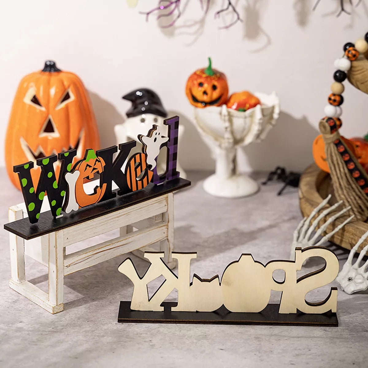 Halloween decorative object set featuring spooky wooden signs with wicked designs for Halloween decoration.