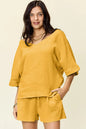 Trendsi double take texture half sleeve T-shirt and drawstring shorts set, featuring a stylish, casual summer outfit in neutral tones.