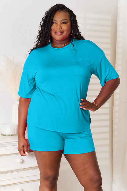 Basic Bae soft rayon half sleeve top and shorts set by Trendsi, featuring a relaxed fit and comfortable fabric in a casual style.