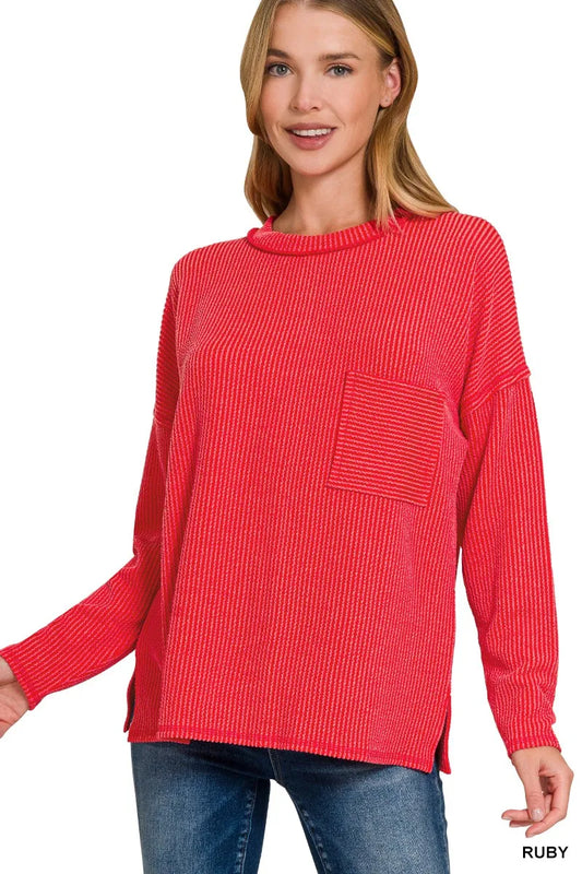 Black Zenana long sleeve drop shoulder ribbed top on a hanger, showcasing its relaxed fit and soft knit fabric.