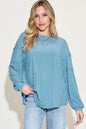 Trendsi Basic Bae ribbed long sleeve T-shirt with round neck, full size, in a solid color, showing the textured fabric and fit.