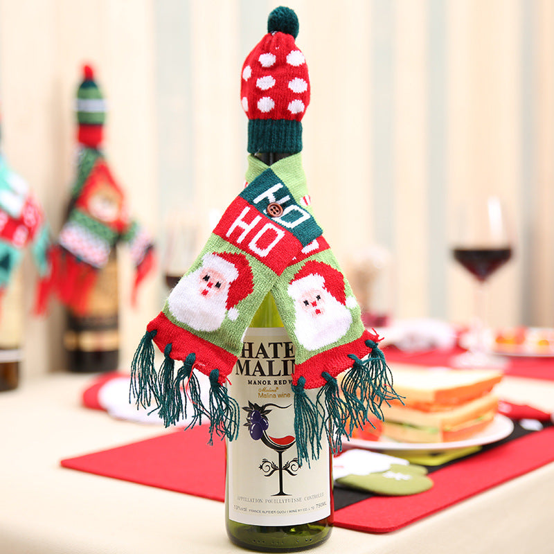 Christmas hat and scarf wine bottle decoration by Trendsi, festive holiday accessory for wine bottles, with red and green accents.