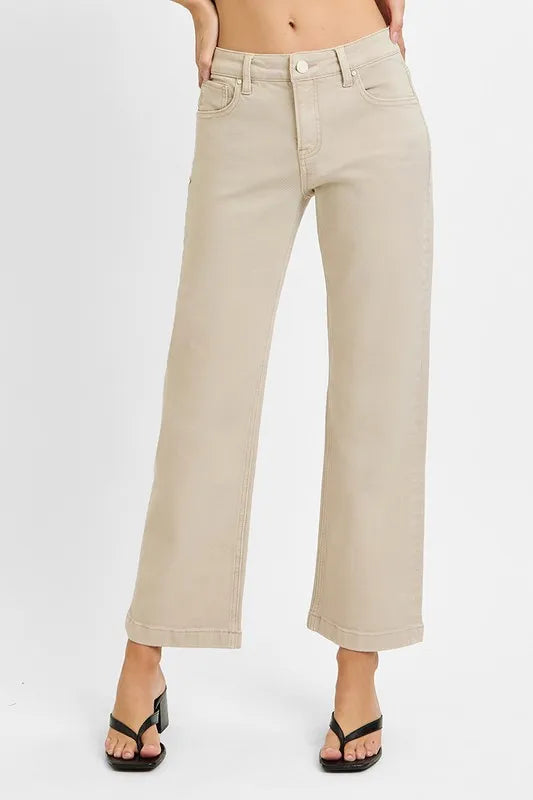 Plus size RISEN full size tummy control mid-rise ankle straight jeans from Trendsi, showing the dark denim fabric and fitted style.