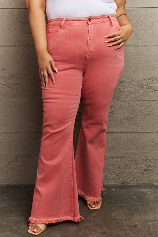 Risen Bailey high waist flare jeans with side slits, denim fabric, and a fitted waist, styled for a trendy casual look.