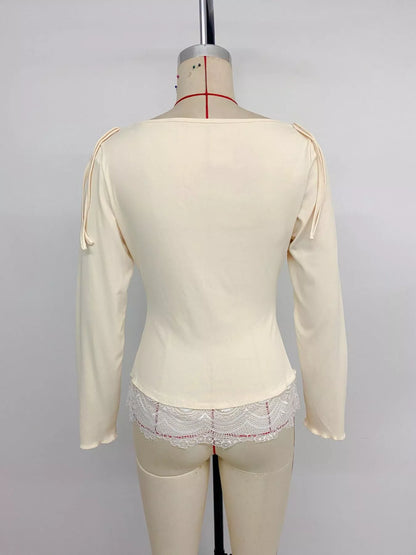 Apricot lace trim long sleeve T-shirt by Trendsi, featuring a soft fabric and delicate lace details on the sleeves.
