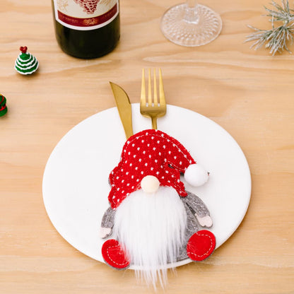 Three faceless gnome cutlery holders in a set, featuring whimsical designs perfect for kitchen or table decor, by Trendsi.