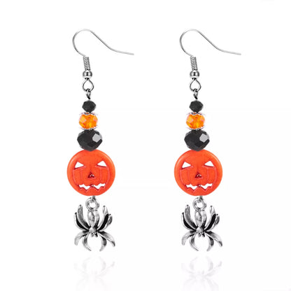 Halloween Spider Pumpkin Drop Earrings featuring spooky pumpkin and spider charms, perfect for festive fall accessories.