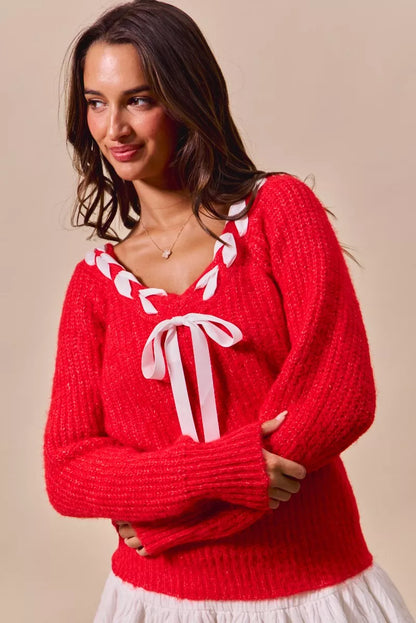 Trendsi SO ME Satin Tape Braided Ribbon Tie V Neck Sweater featuring a soft satin ribbon detail and a classic V neckline.
