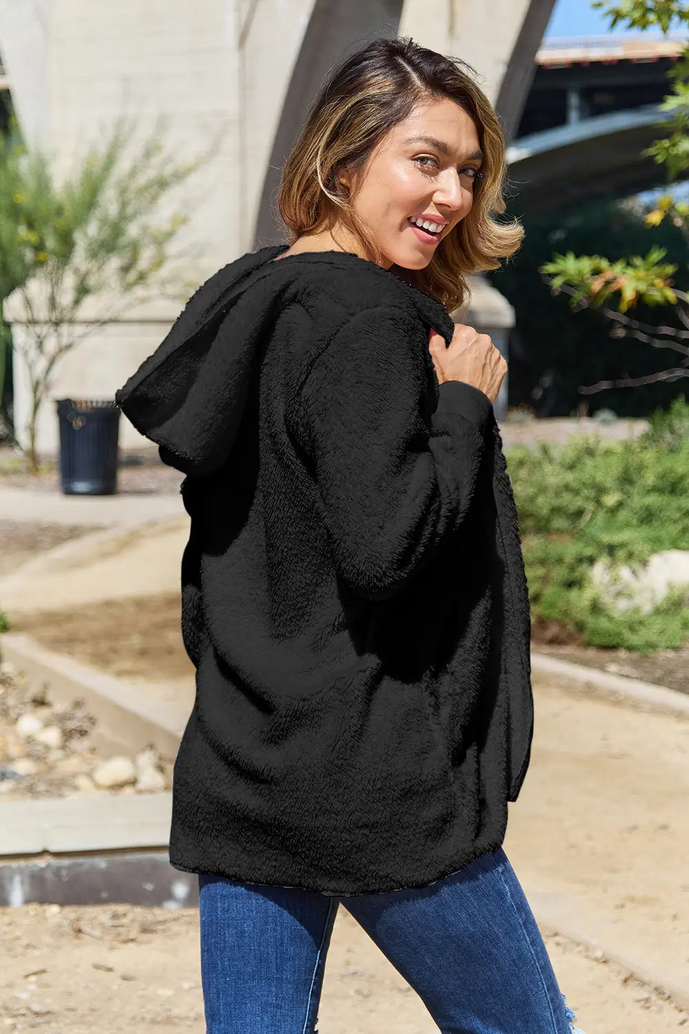 Full size Teddy hooded jacket with pockets from Trendsi, featuring soft plush fabric and a cozy hood for cold weather.