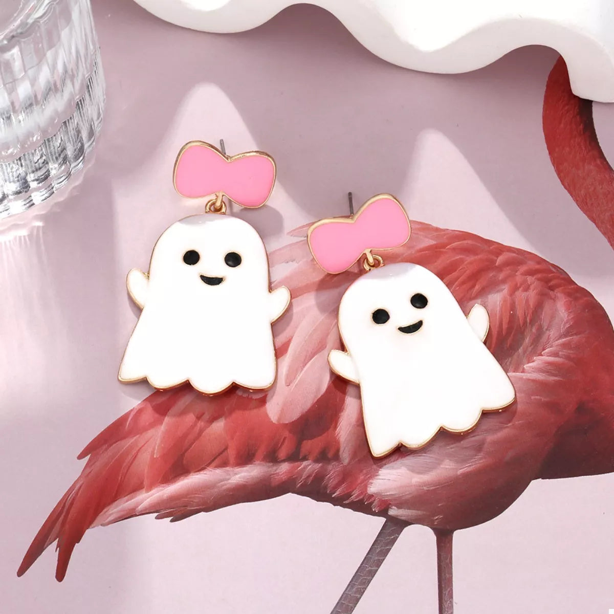 Halloween ghost dangle earrings with bow, trendy Halloween jewelry featuring cute ghost design and decorative bow.