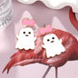 Halloween ghost dangle earrings with bow, trendy Halloween jewelry featuring cute ghost design and decorative bow.