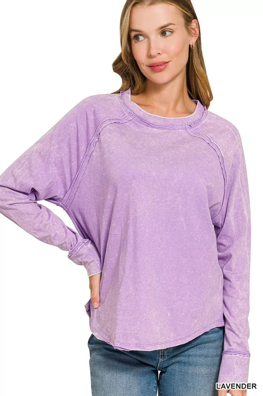 Close-up of a Zenana washed round neck long sleeve top in soft fabric, featuring a casual, relaxed fit.