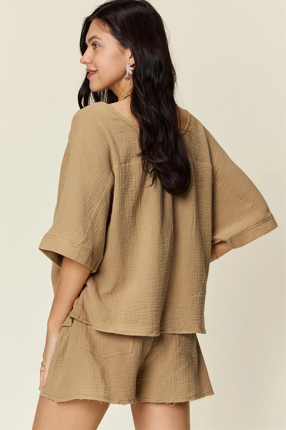 Trendsi Double Take Texture half sleeve T-shirt and drawstring shorts set, featuring a textured fabric in neutral tones.