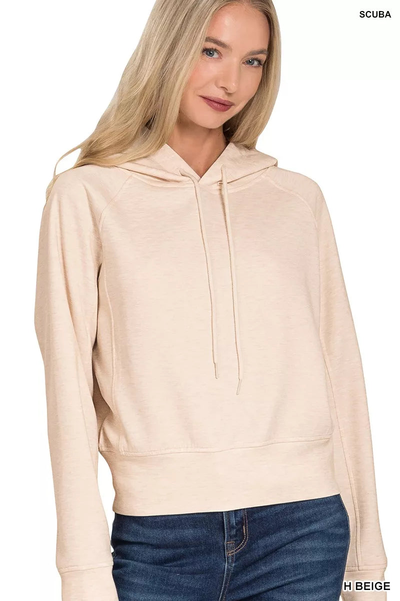 Zenana drawstring scuba hoodie by Trendsi, featuring a fitted style with a drawstring hood and sleek black fabric.