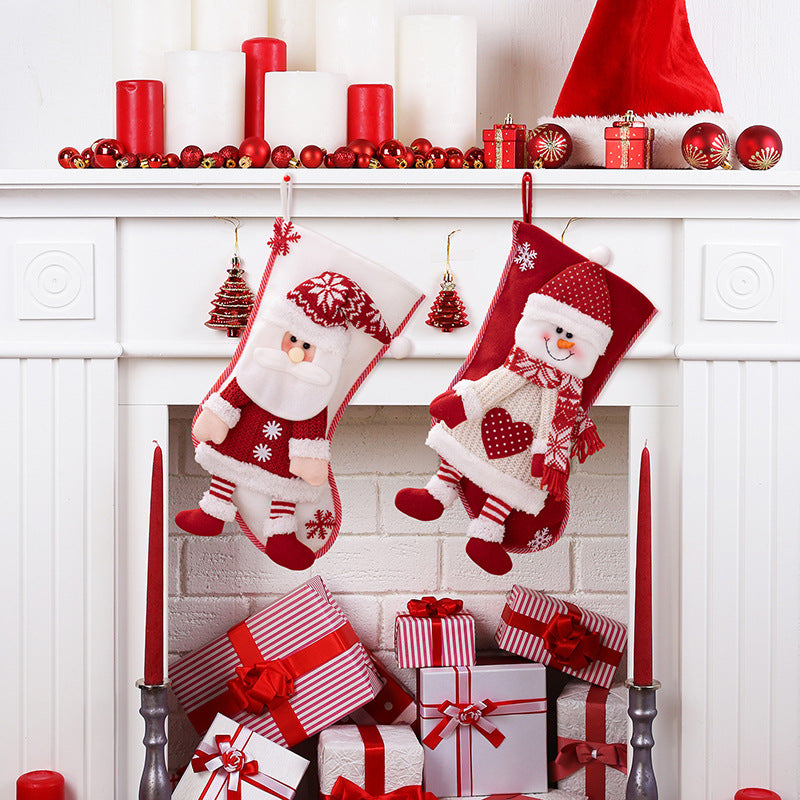 Red Christmas stocking hanging widget by Trendsi, featuring festive design and plush fabric for holiday decor.