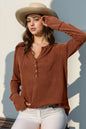 Long sleeve T-shirt with notched thumbholes, full size, trendy design by Trendsi, shown in a casual fit with a comfortable look.