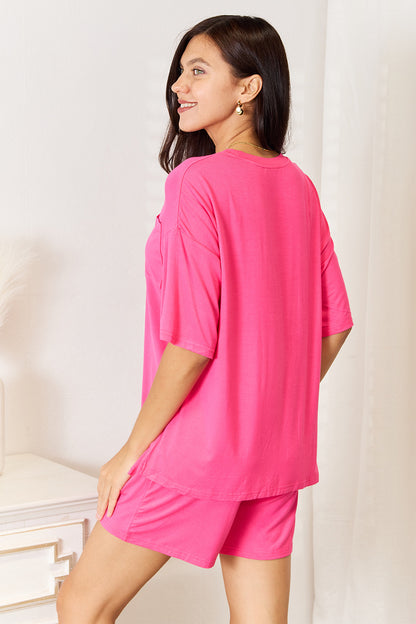 Basic Bae full-size soft rayon half sleeve top and shorts set by Trendsi, featuring a relaxed fit and comfortable fabric.