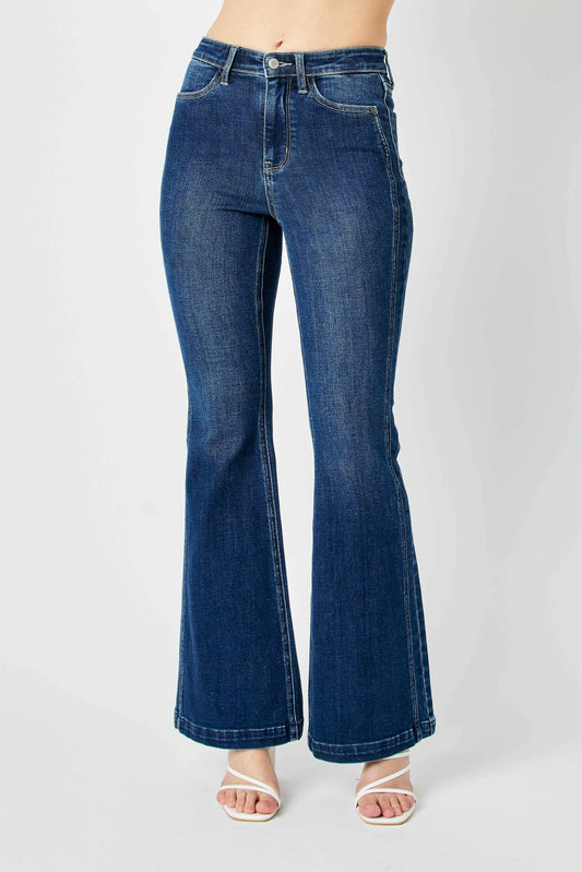 Plus size Judy Blue flare jeans with angled side seam detail and full-length fit, featuring trendy denim design and classic denim wash.