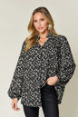 Plus size leopard print long sleeve blouse by Trendsi featuring a stylish double take full-size design.
