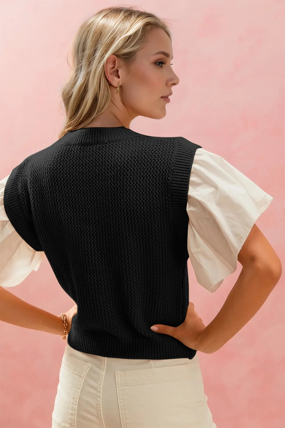 Trendsi Oh full size ruffled round neck short sleeve sweater in soft knit fabric, featuring a feminine ruffled neckline and relaxed fit.