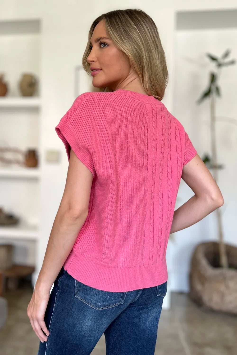 Plus size cable-knit round neck short sleeve sweater by Trendsi, featuring a double take full size design in a cozy, textured knit fabric.