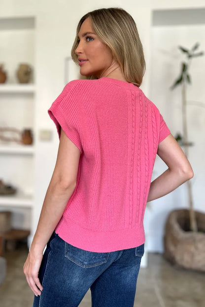 Plus size cable-knit round neck short sleeve sweater by Trendsi, featuring a double take full size design in a cozy, textured knit fabric.