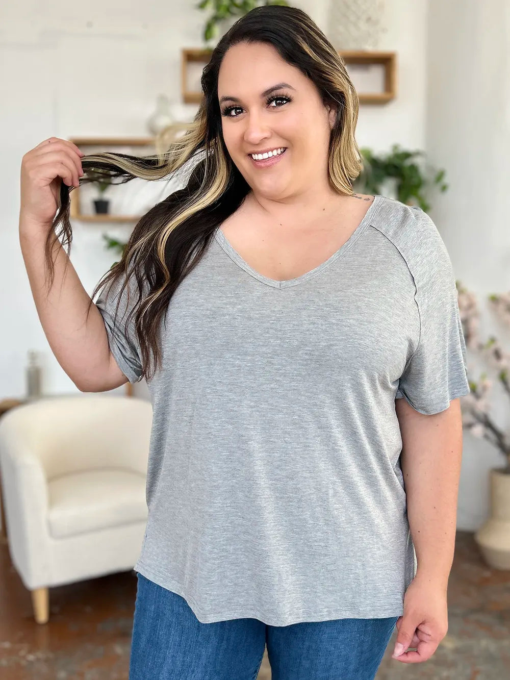 Basic Bae bamboo V-neck T-shirt by Trendsi, full size, short sleeves, with a slit design, made from soft bamboo fabric.