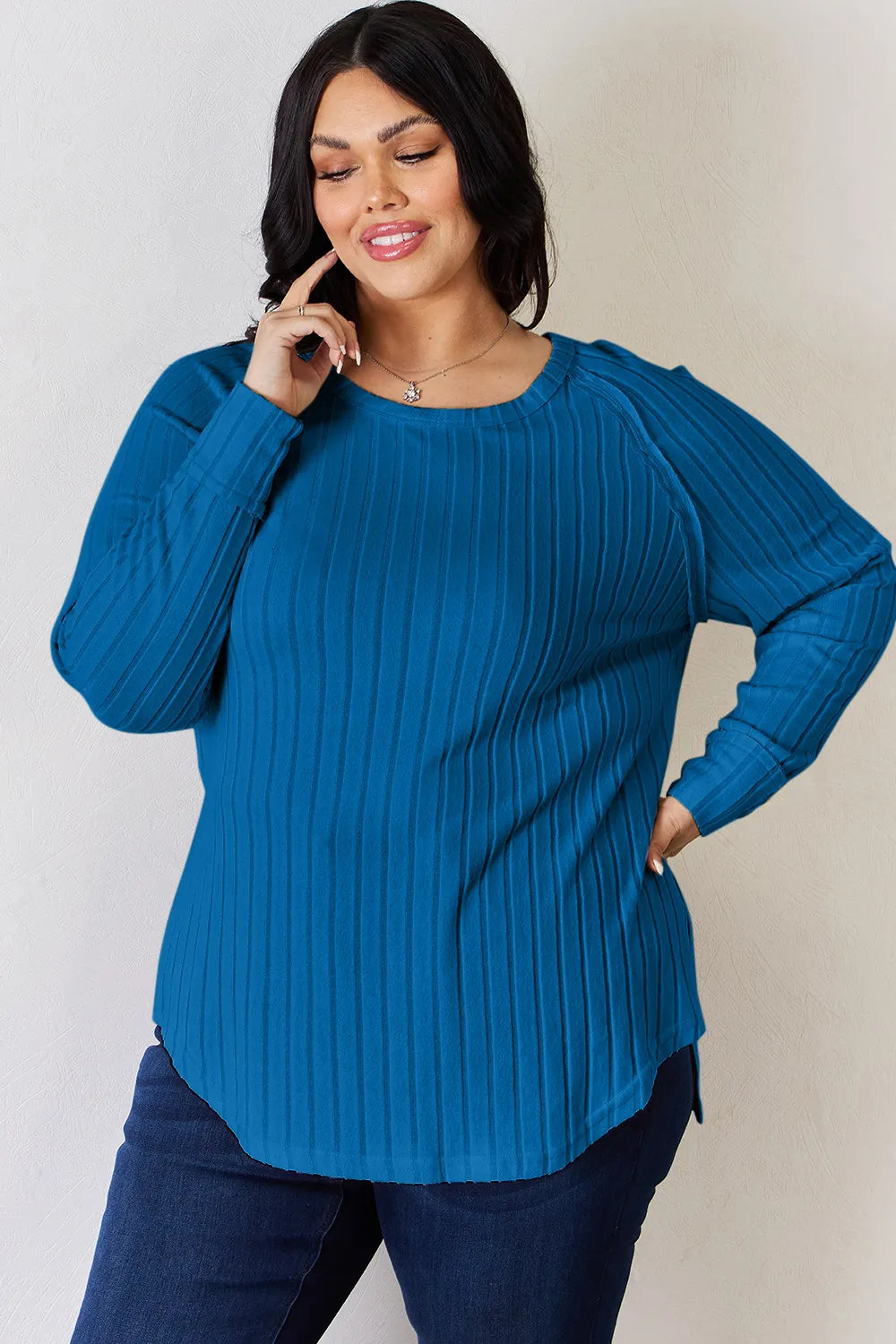 Trendsi Basic Bae full-size ribbed round neck slit T-shirt in beige, showcasing its ribbed fabric and relaxed fit.