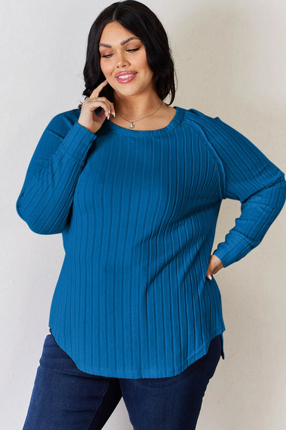Trendsi Basic Bae full-size ribbed round neck slit T-shirt in beige, showcasing its ribbed fabric and relaxed fit.