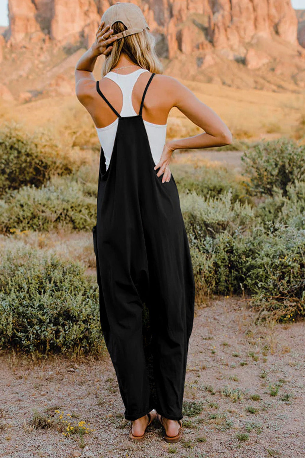Black double take full size v-neck sleeveless jumpsuit with pockets, stylish and comfortable for casual wear.