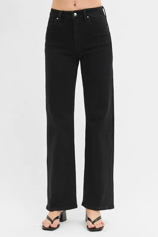 Plus size RISEN high rise wide leg jeans by Trendsi, featuring a full length, relaxed fit, and classic denim wash.