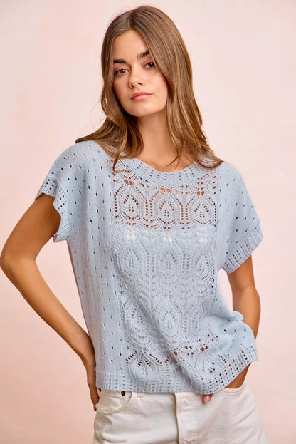 BiBi Washed Eyelet Short Sleeve Breathable Knit Top by Trendsi, featuring eyelet details and lightweight, comfortable fabric.