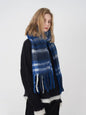 Fringe plaid polyester scarf by Trendsi featuring a stylish checkered pattern and tassel details.