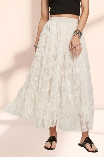 Beige ADORA elastic waist cloud fluffy maxi skirt by Trendsi, styled with soft, lightweight fabric and a relaxed fit.