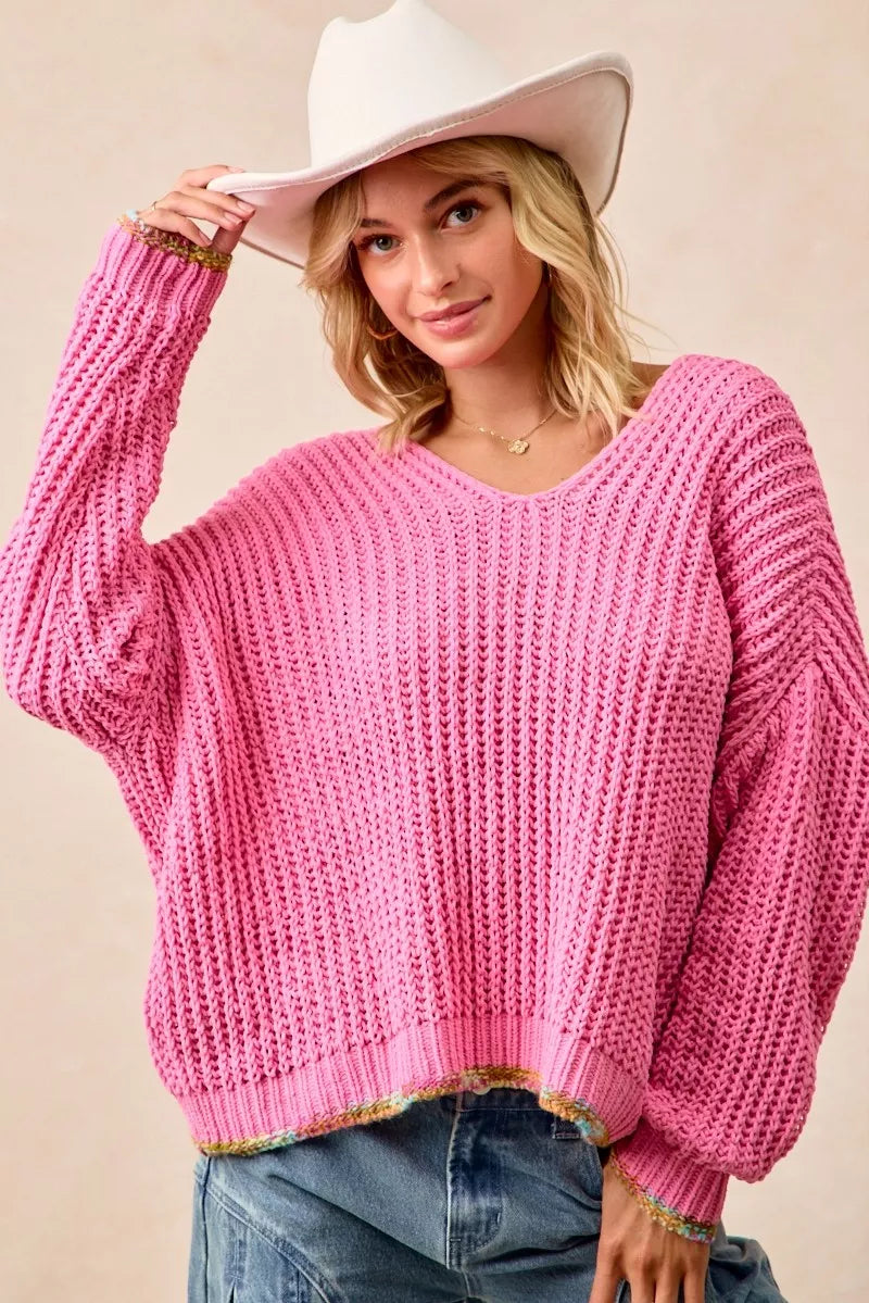 BiBi V-neck sweater with colorful trim in soft knit fabric, featuring a fitted style and vibrant detailing from Trendsi.